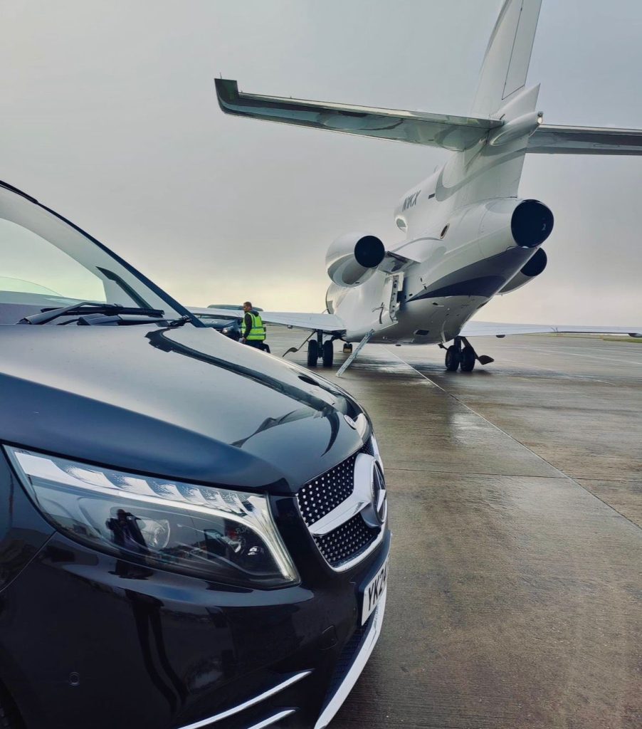 Mercedes V-Class chauffeur vehicle alongside a private jet at XLR Liverpool